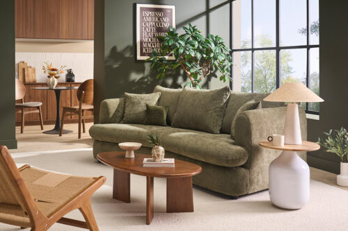 salon canapé vert table basse bois foncé