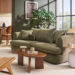 salon canapé vert table basse bois foncé